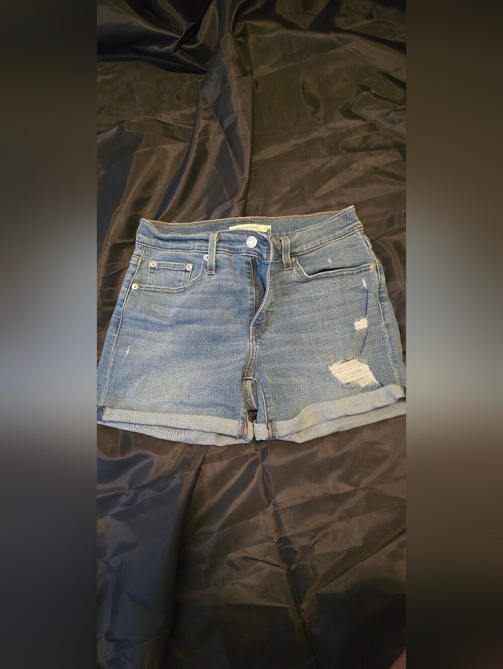 Levi's Light Blue Distressed Denim Shorts
